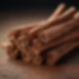 Close-up of cinnamon sticks with a rustic backdrop