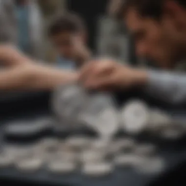 Modern collectors examining Roman silver denarius coins during a numismatic exhibit.